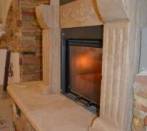 Fireplace Marco Simone: rustic slats and frame travertine